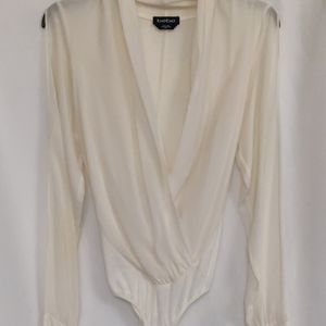 NWOT BEBE long sleeved body suit